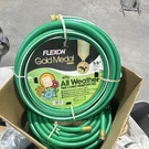 Flexon Gold Medal Series 5/8 4 Ply All Weather Hose Brass Couplings Green. Fixed Price $30.12.