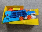 Hot Wheels City Toy Car Track Set, Ultimate T-rex Transporter, Hauler Transform. Fixed Price $65.00.