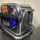 Ge Stainless Steel Toaster #106808 Series C2250B1. Fixed Price $24.99.