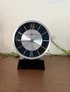 Howard Miller Tabletop "davis" Clock Silver Brushed Aluminum Black Crystal Base. Fixed Price $150.00.