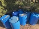 55 Gallon Blue Plastic Water Barrel Drums With Vent Circular Above Ground. Fixed Price $200.00.