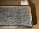 General Electric 2284074 Aluminum Air Filter Assembly For Closed Small Dent. Fixed Price $14.49.