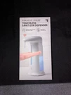 Sharper Image Touchless Sanitizer Dispenser # 1013777. Fixed Price $6.00.