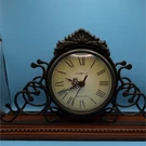 Howard Miller Cassandra Mantel Clock 635-130 Wrought Iron Windsor Cherry Base. Fixed Price $50.00.