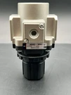 New-smc AR40-N04-Z Pneumatic Regulator 7 Vac 125 Psi. Fixed Price $29.95.